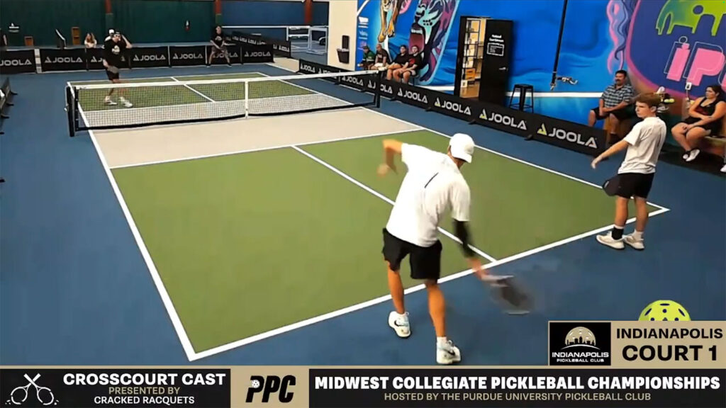 Mid-action shot of a pickleball game.